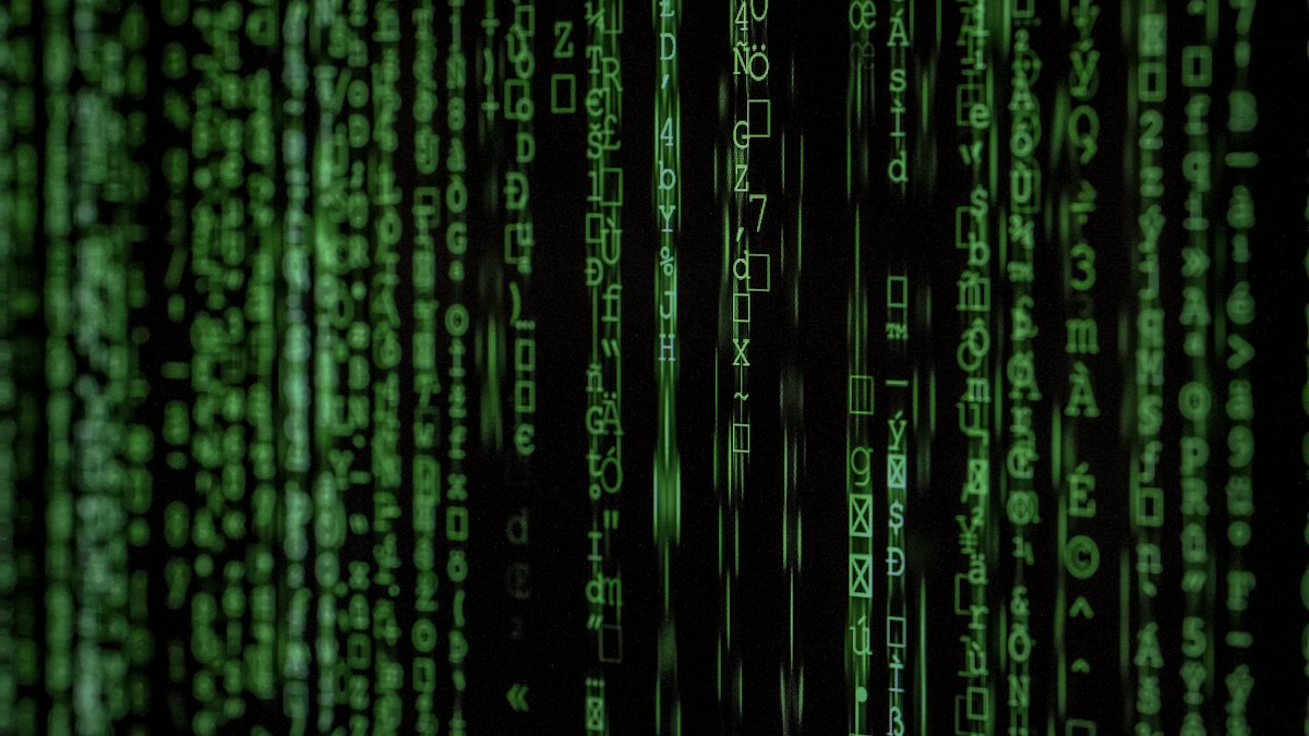 Laptop with code on screen, topical security-engineering image